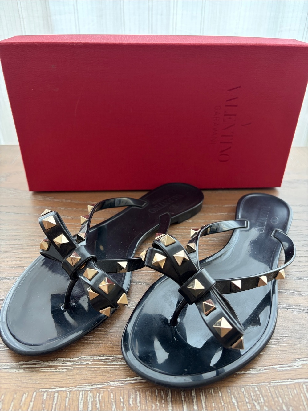 Valentino Black Jelly Thong Sandals with Gold Pyramid Studs